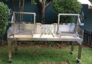 Double Argentinian braai with rotisseries all stainless steel 304 grade and high heat clay table